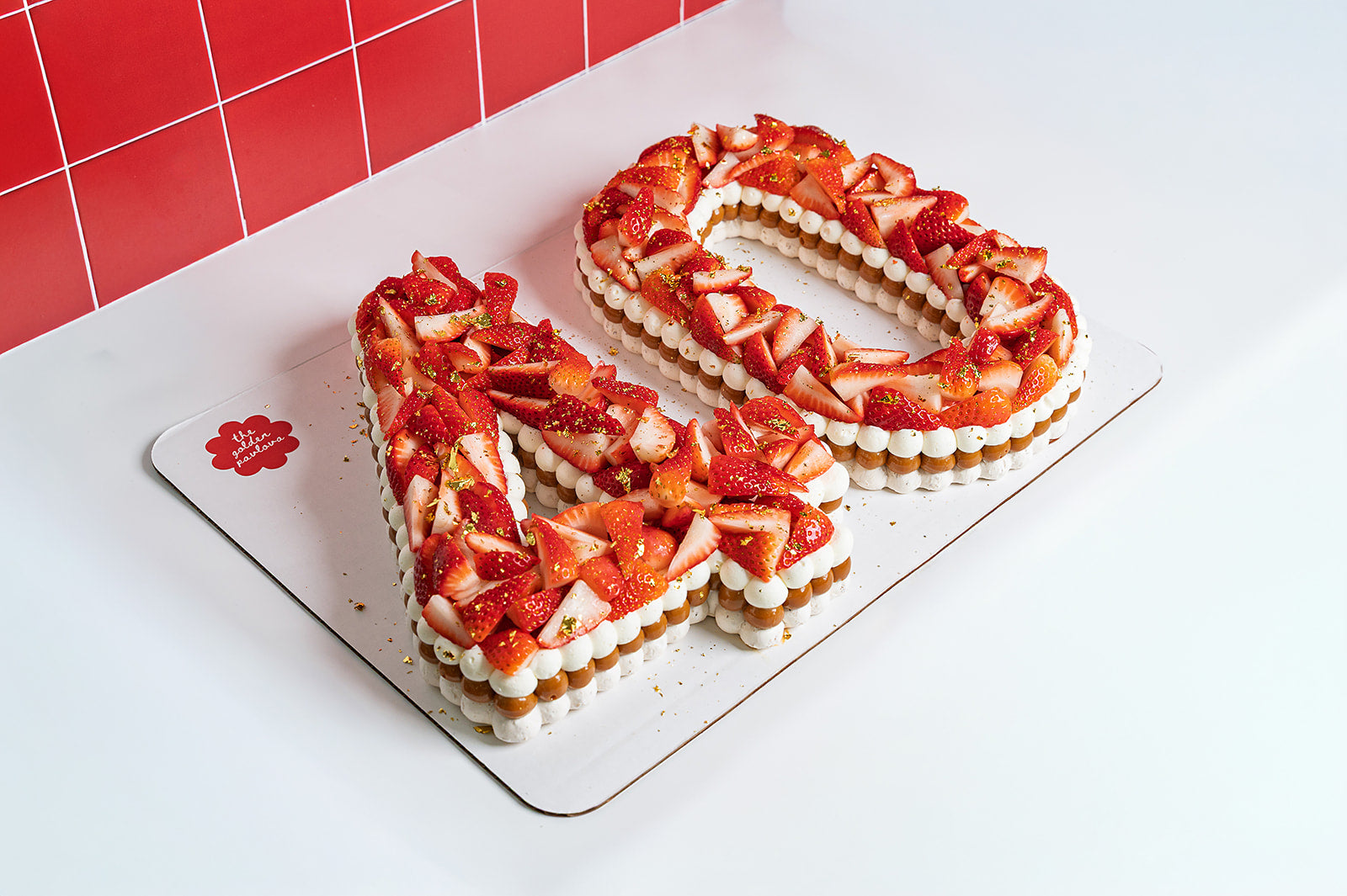 Custom Double Digit Pavlova dessert with strawberries, dulce de leche and whipped cream, handmade gluten free celebration cake in Miami